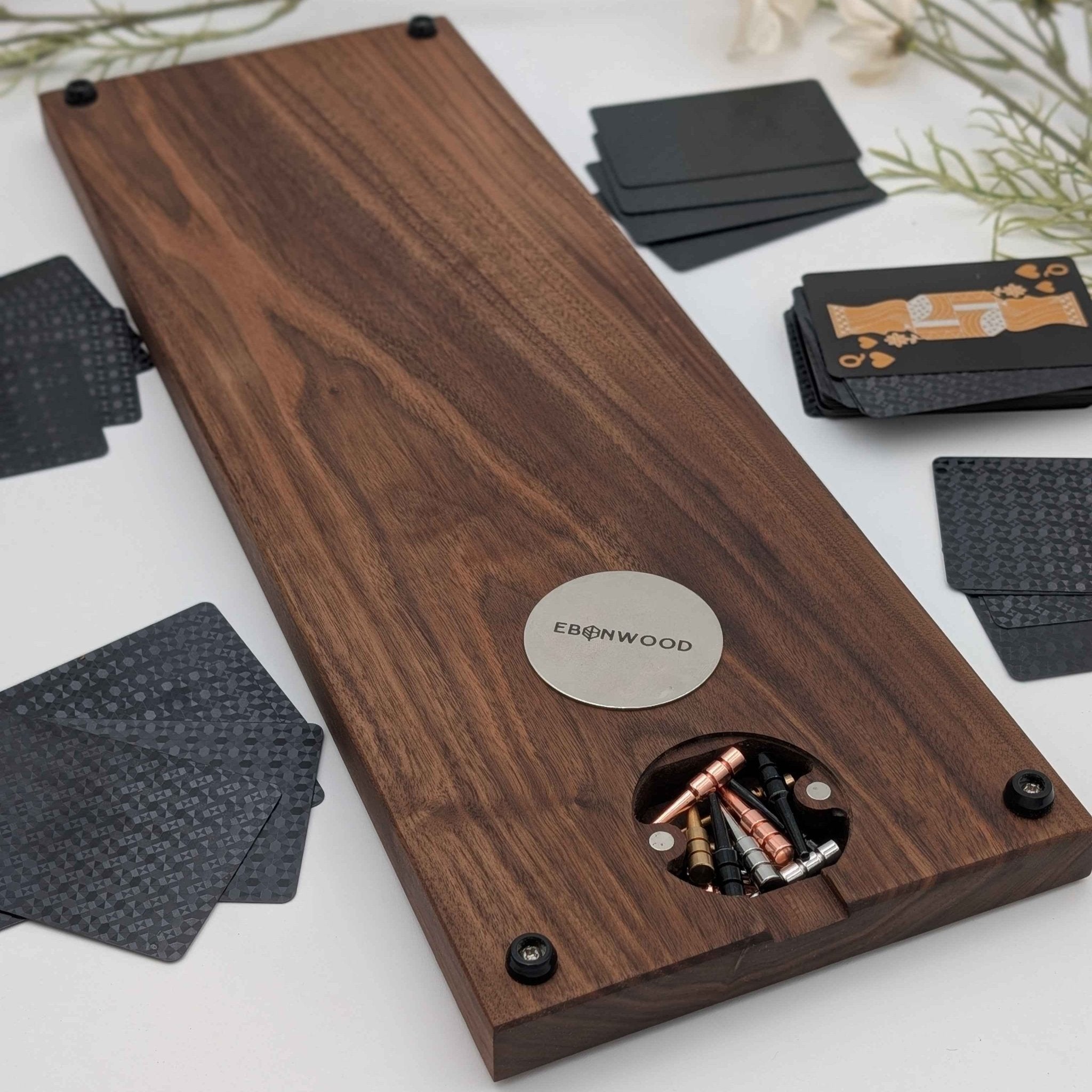 Handmade Cribbage Board walnut wood with pegs and cards on white background