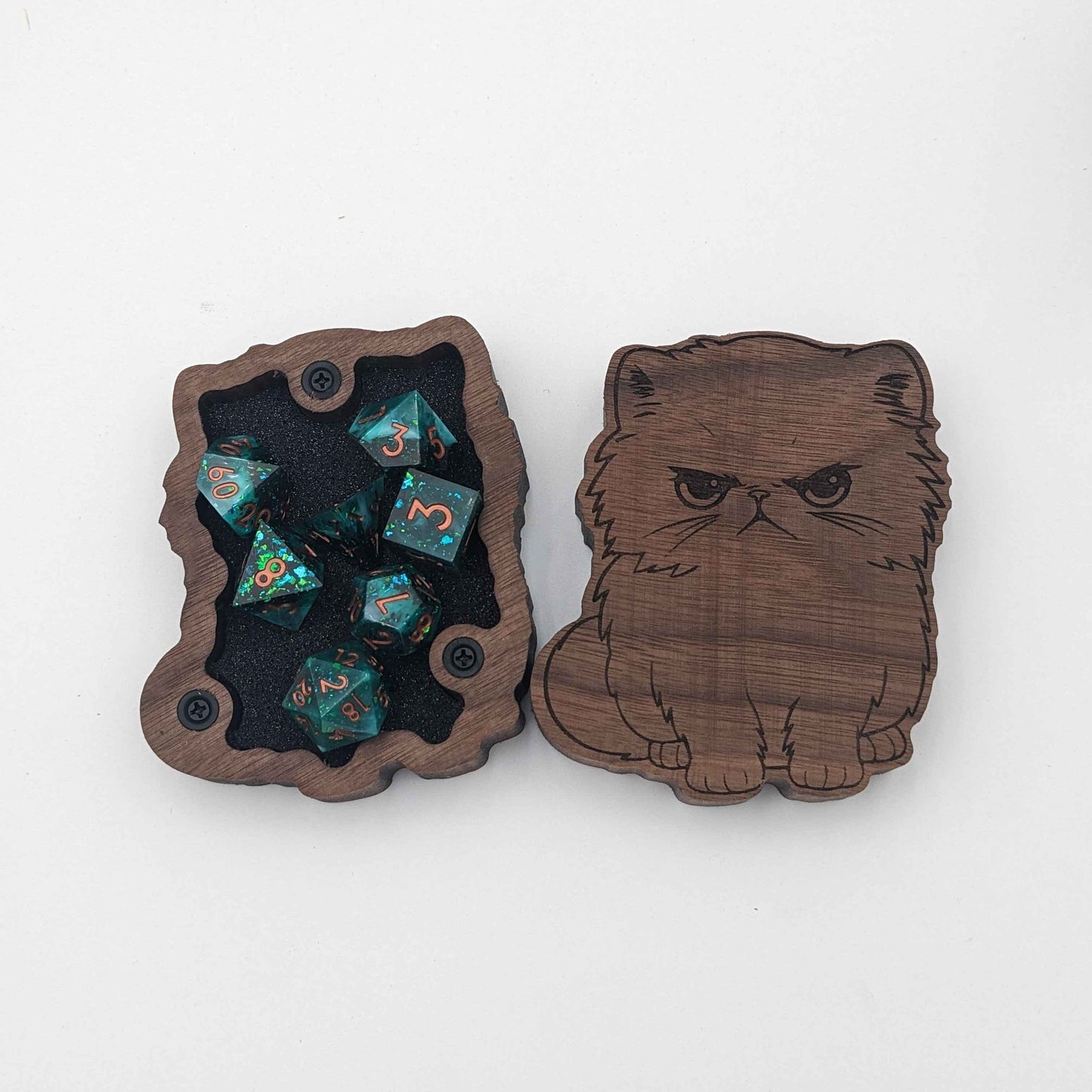 cat shaped dice storage with magnetic enclosure flat lay on white background