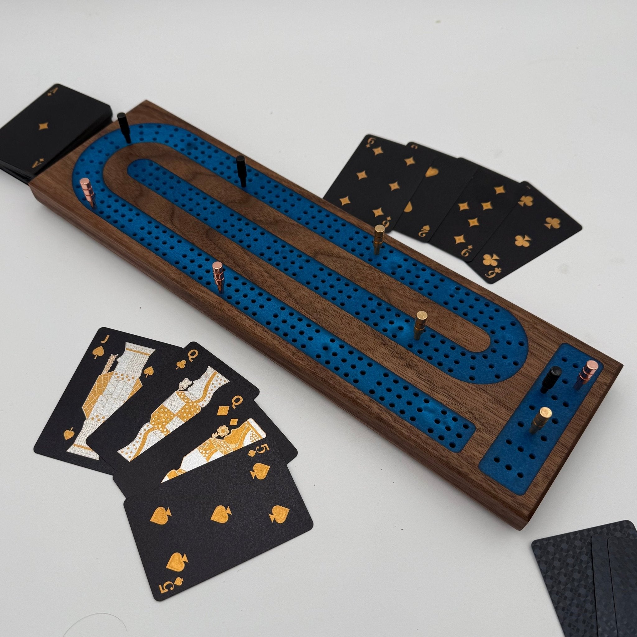 handmade 3 player walnut cribbage board with blue resin inlay