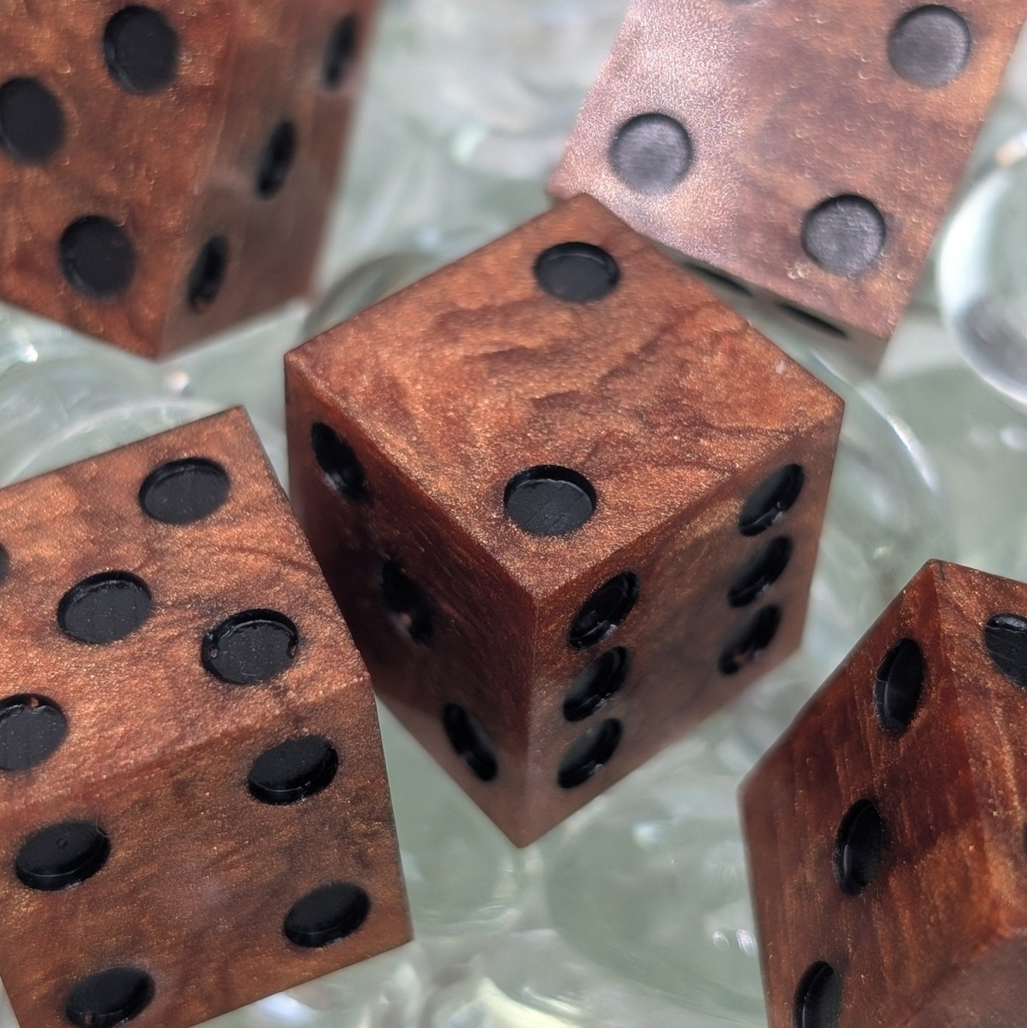 close up of copper sharp edge resin d6 set