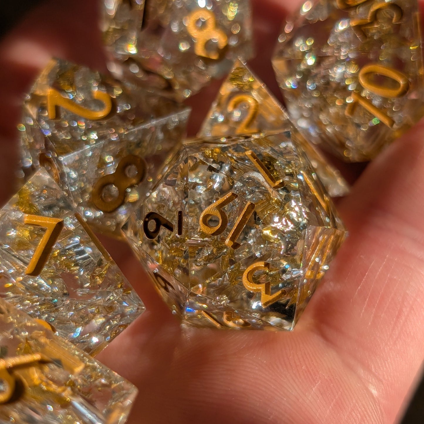 Fantasy dice set with gold foil theme, perfect for tabletop RPG gifts or collectors