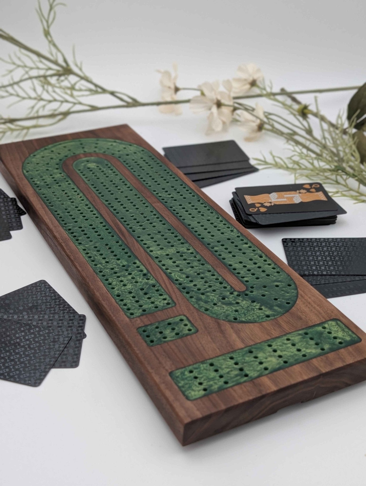 4_lane_walnut_cribbage_board_with_green_epoxy_inlay