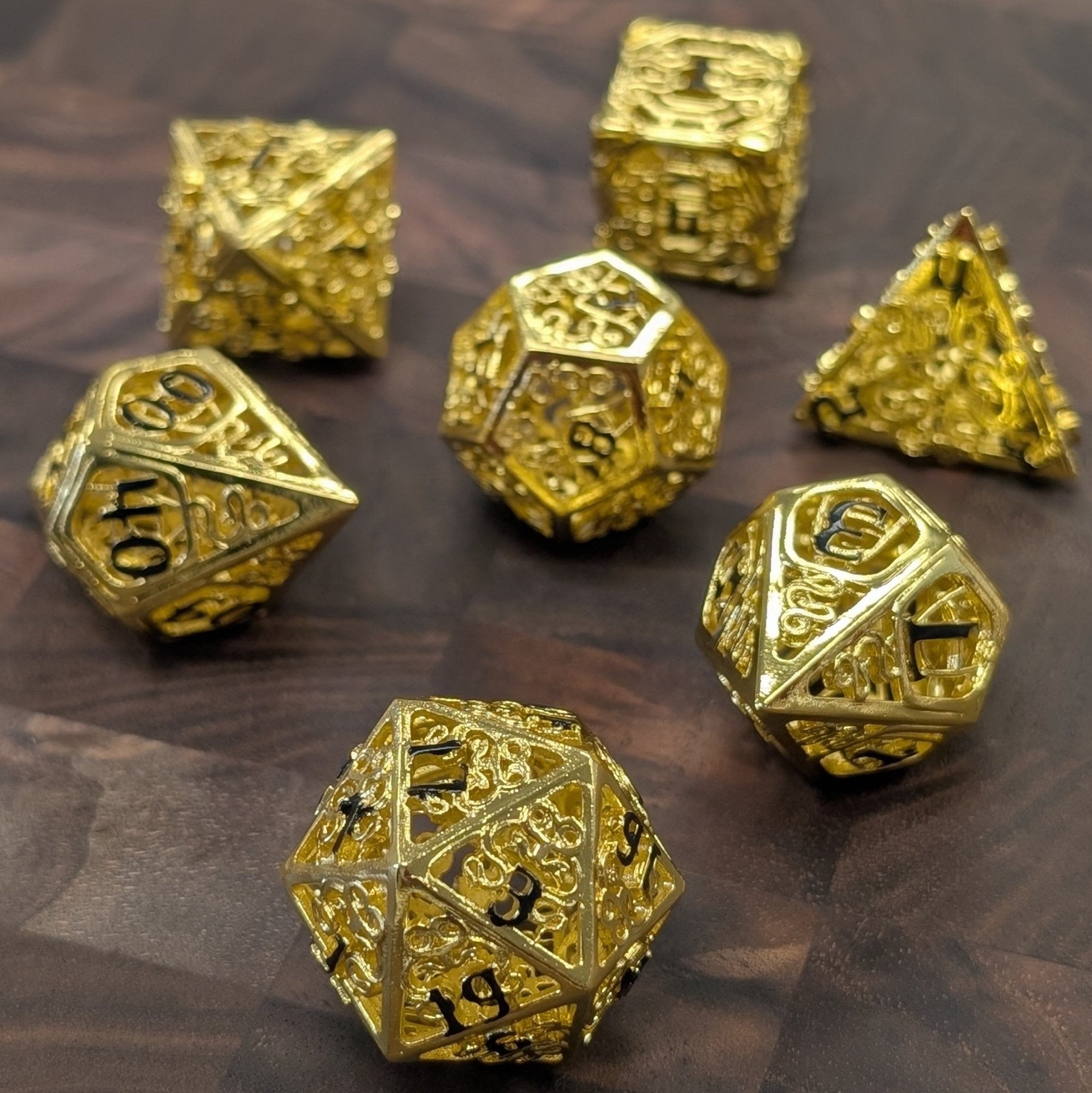 7 Piece Metal Polyhedral Dice Set with Gold Finish and Black Ink