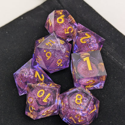 Liquid core dice on black background for high contrast viewing