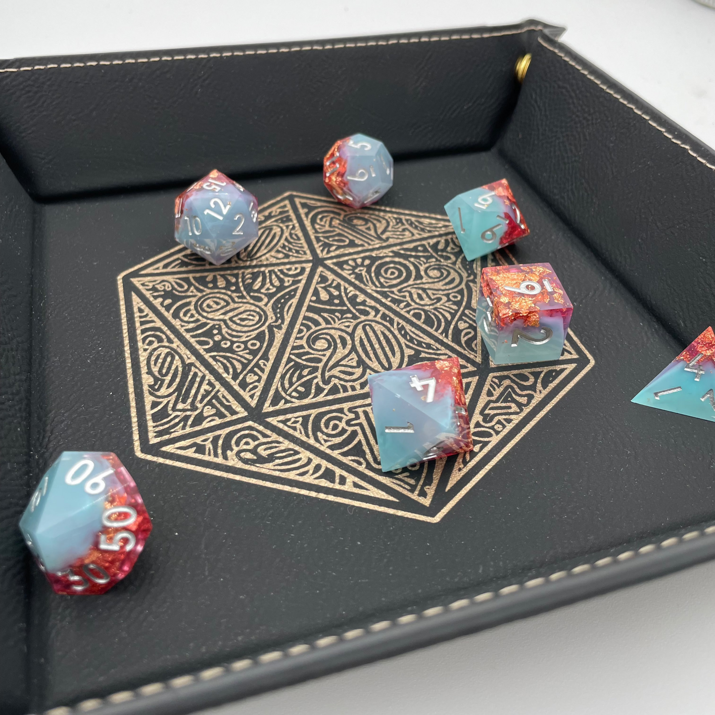 dungeons and dragons dice tray featuring a golden floral d20