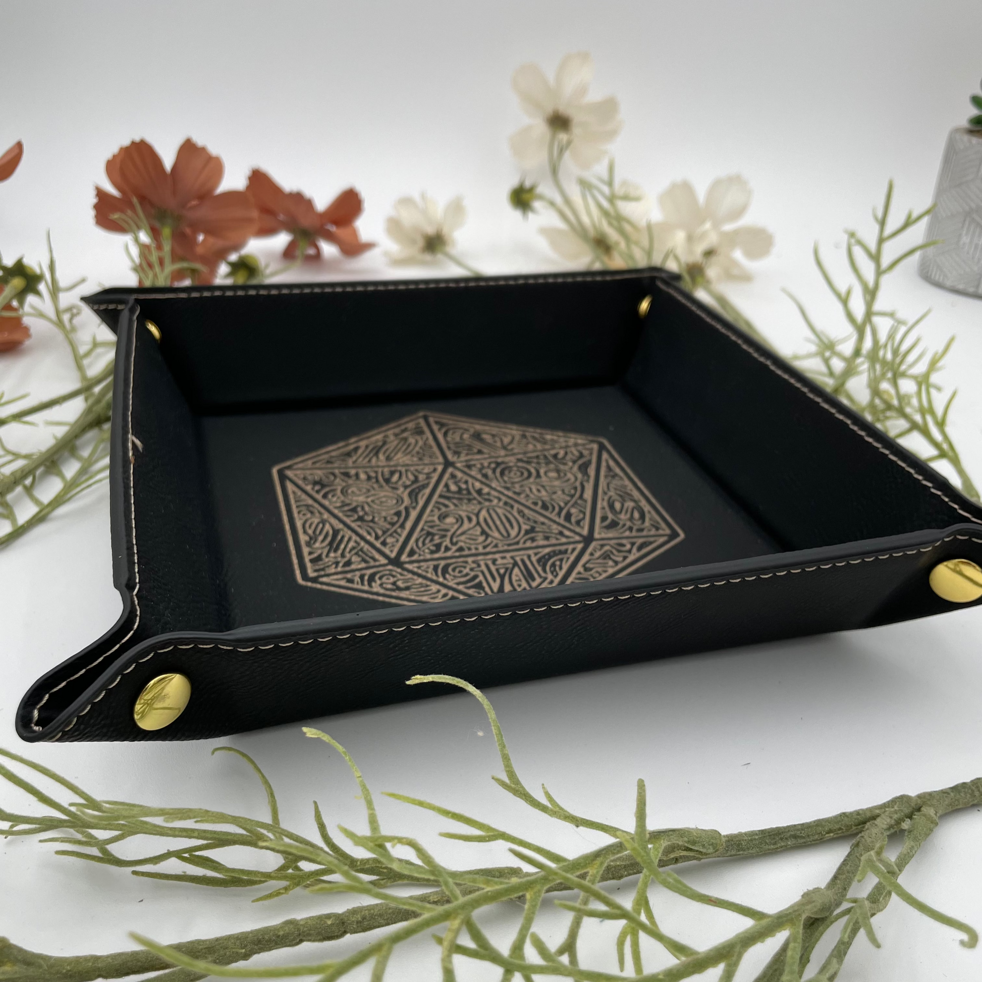 dungeons and dragons dice tray featuring a golden floral d20