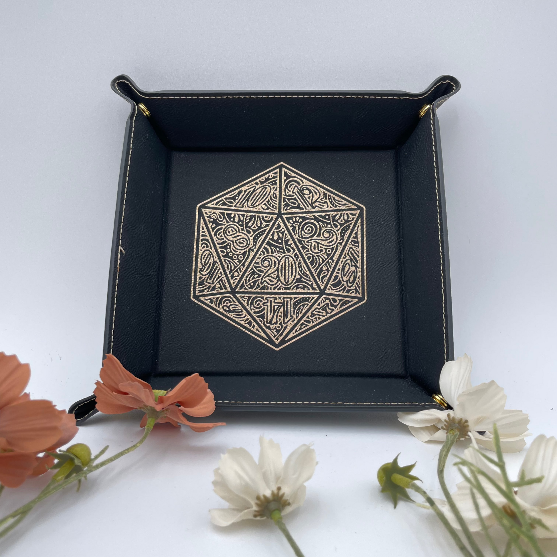 dungeons and dragons dice tray featuring a golden floral d20