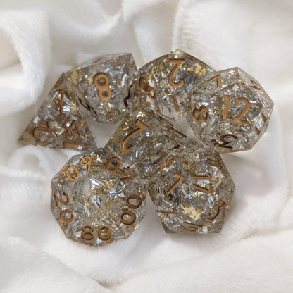 Detailed photo of Emberlight Veil D20 die with foil shimmer and clean inked edges
