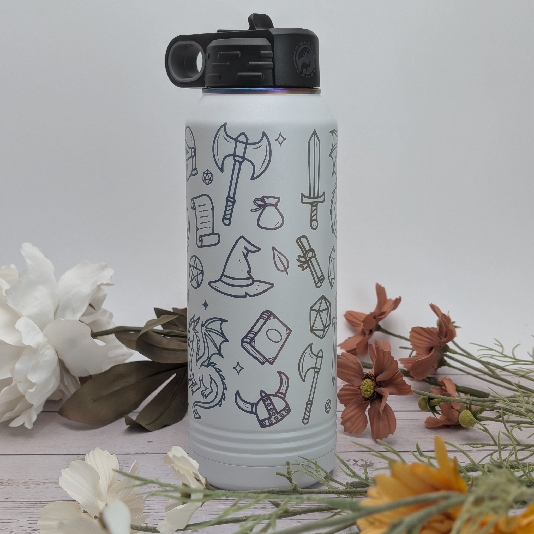 White water bottle with prismatic art design engraved it.