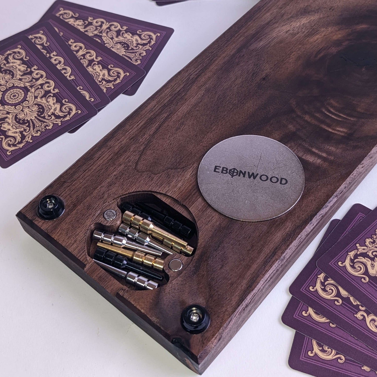 walnut cribbabe board with peg storage and metal plate