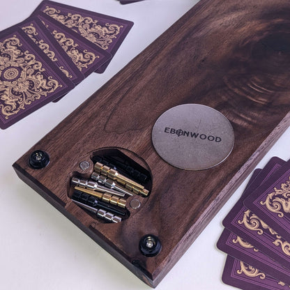walnut cribbabe board with peg storage and metal plate