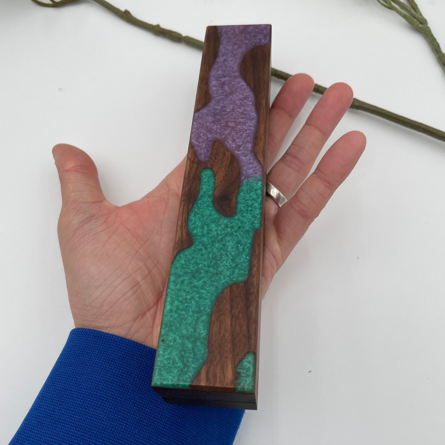 Purple and Green Resin and Walnut Dice Vault Held in Open Hand