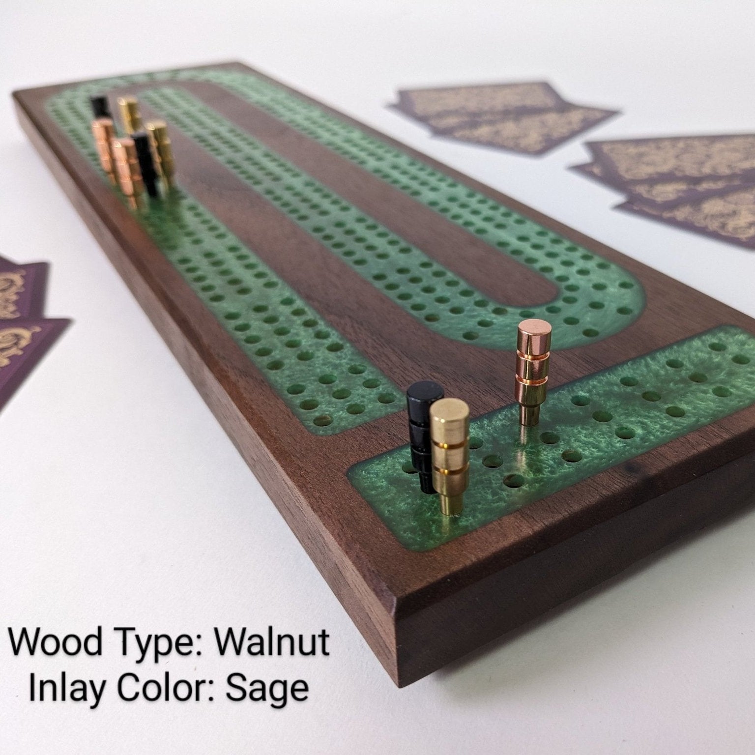 Close-up of Ebonwood cribbage board wood grain and resin scoring track